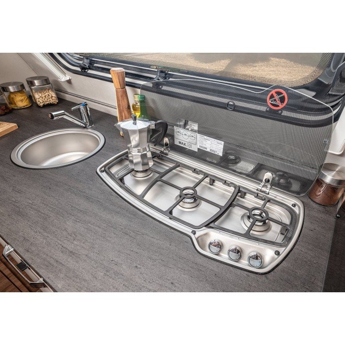 De keuken heeft een hoogwaardig, makkelijk te reinigen aanrecht, een 3‐pitskookplaat en RVS-gootsteen. afbeelding